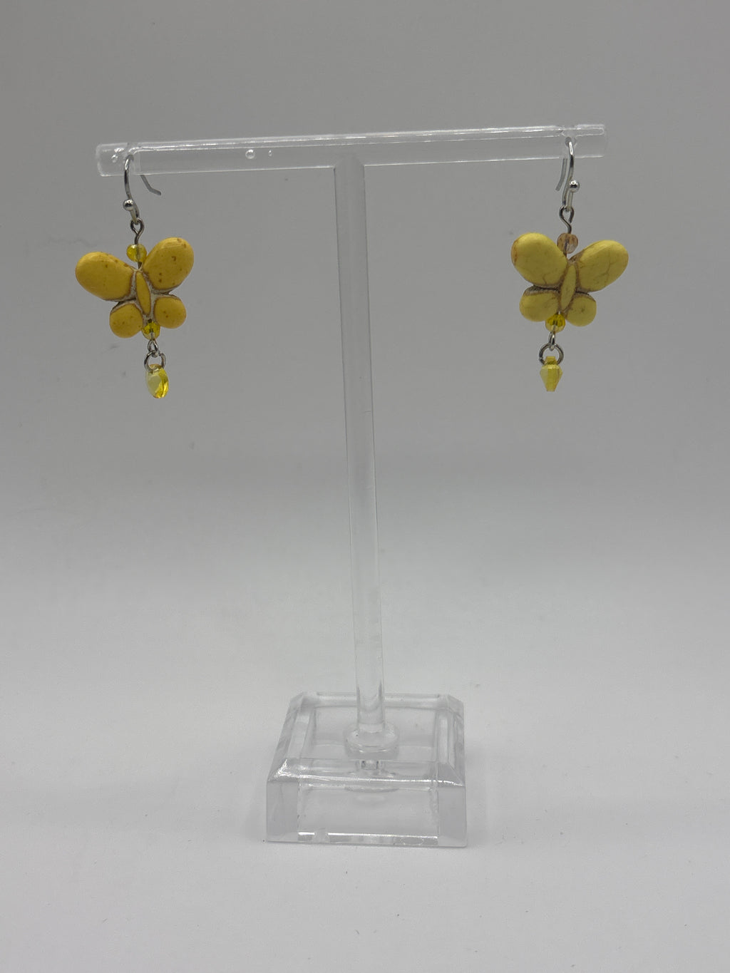 Yellow butterfly with yellow dangle