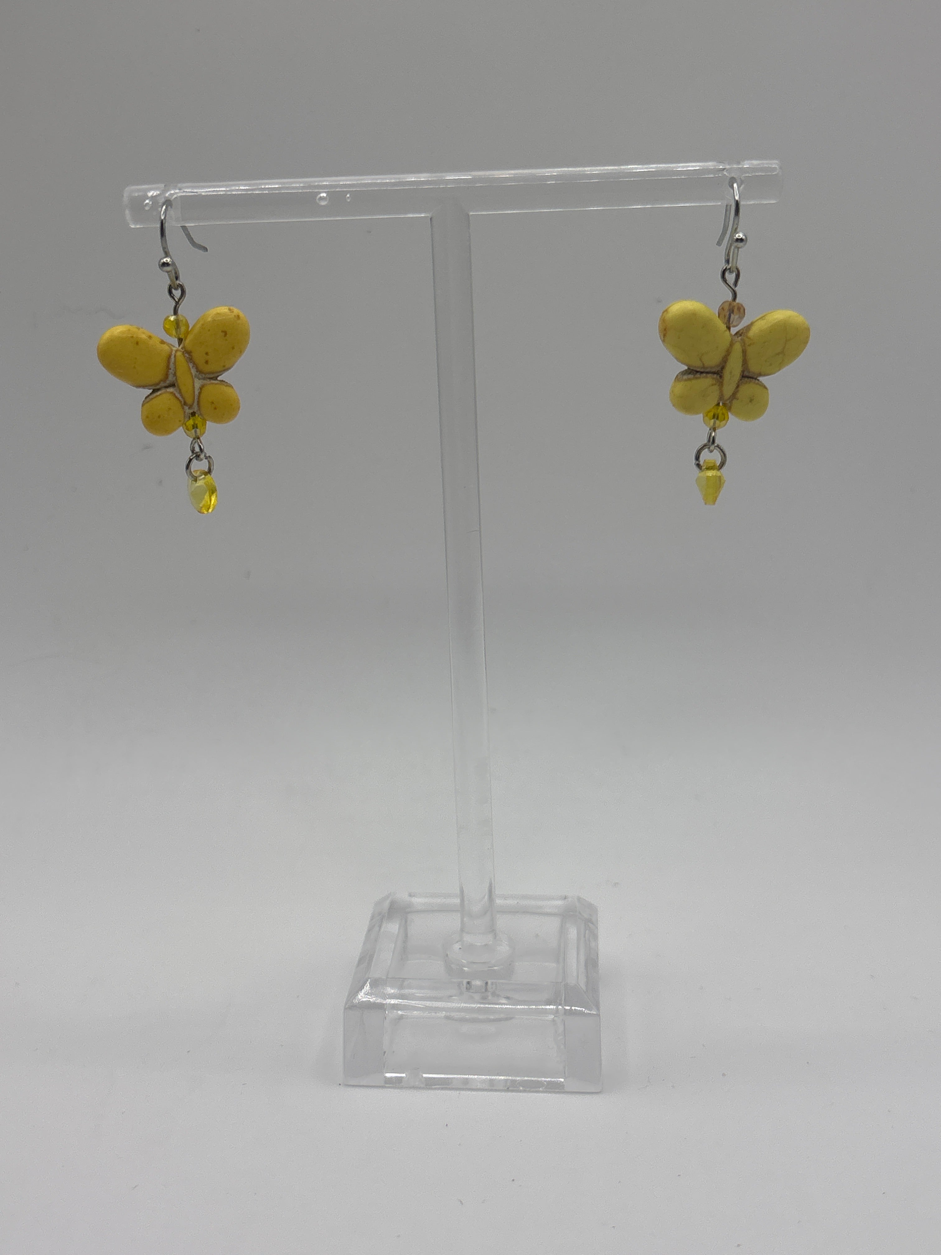 Yellow butterfly with yellow dangle