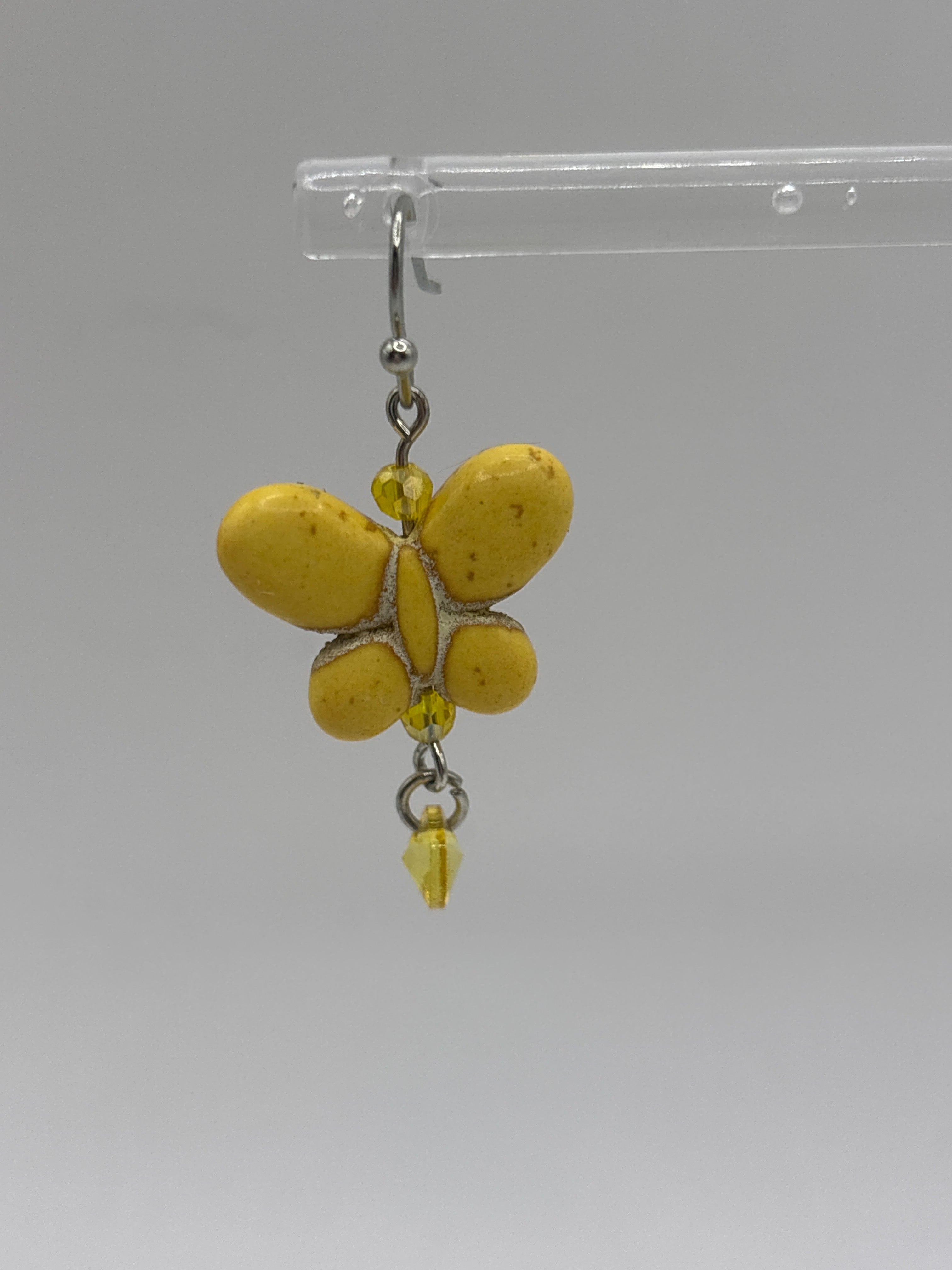 Yellow butterfly with yellow dangle