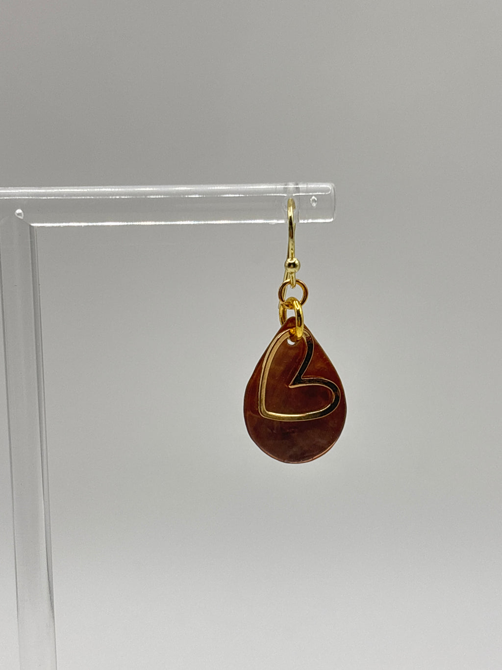 Bronze shell with gold tone heart