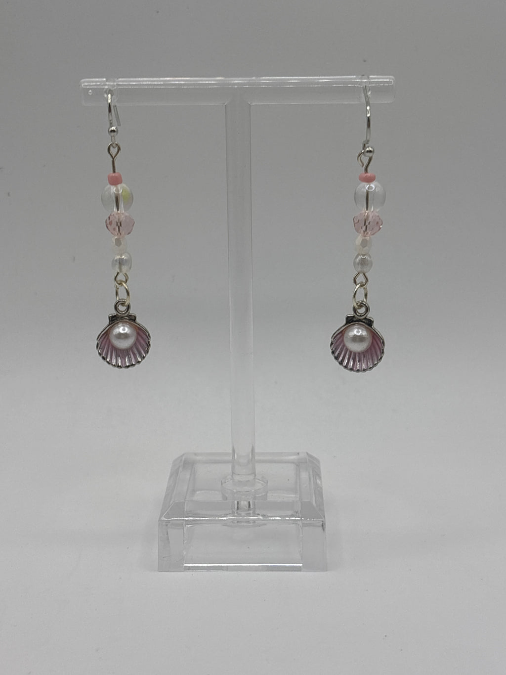 Silver tone shell with pink accents, bubbles and beads, dangle