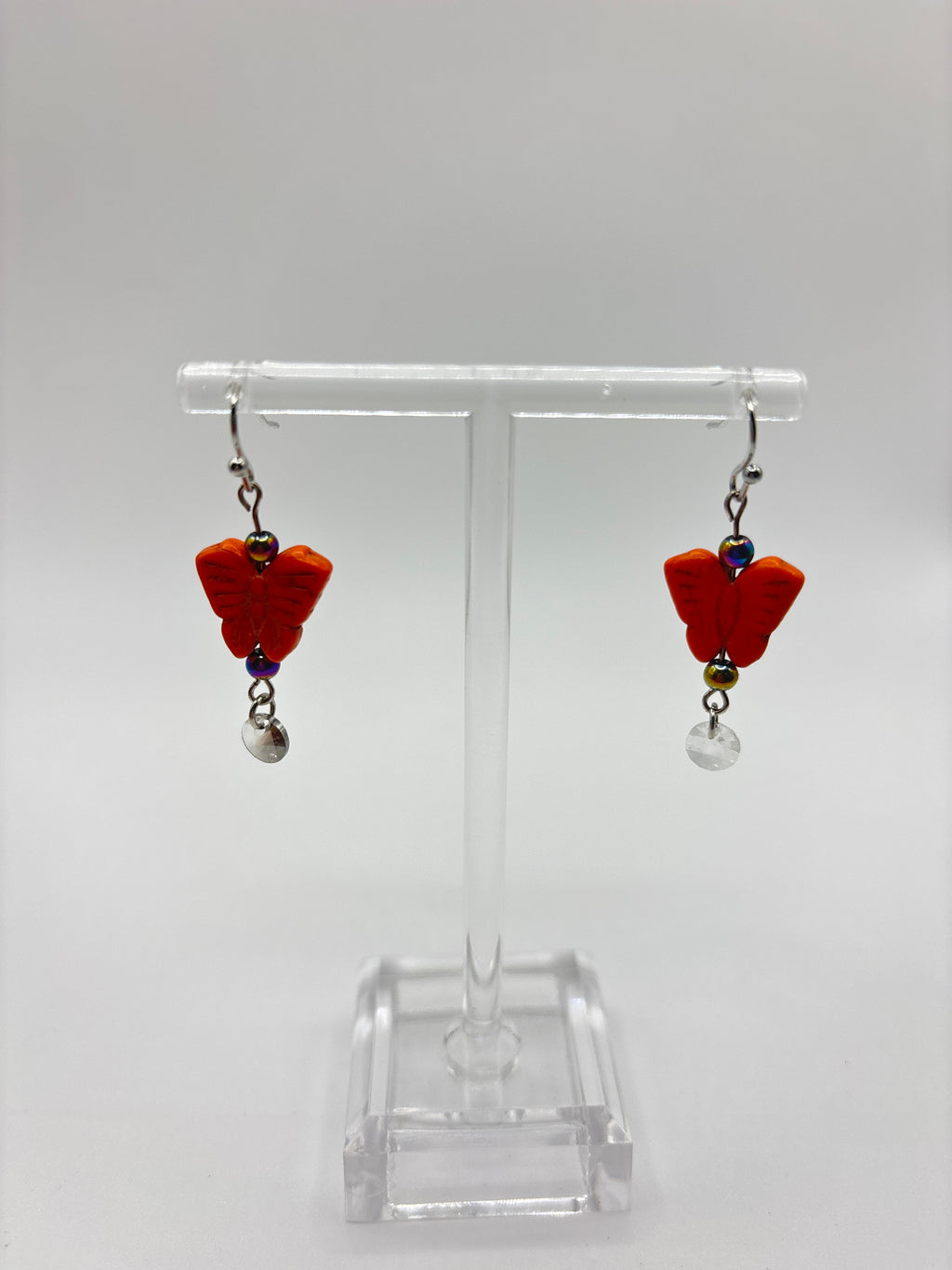 Orange butterfly with white crystal