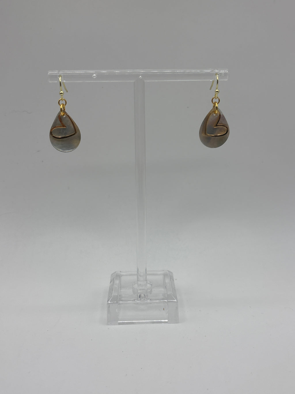 Teardrop white shell with gold tone heart