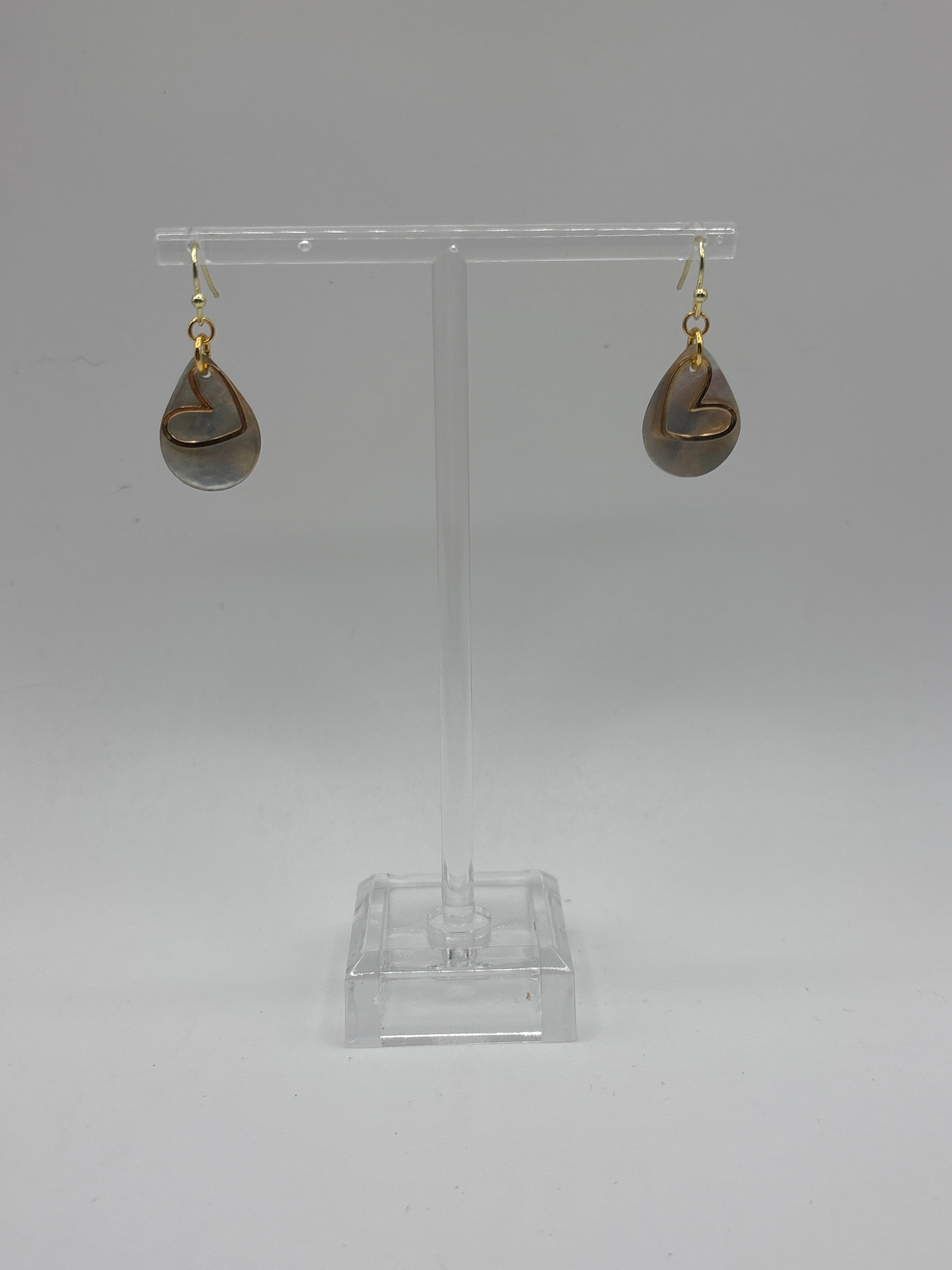 Teardrop white shell with gold tone heart