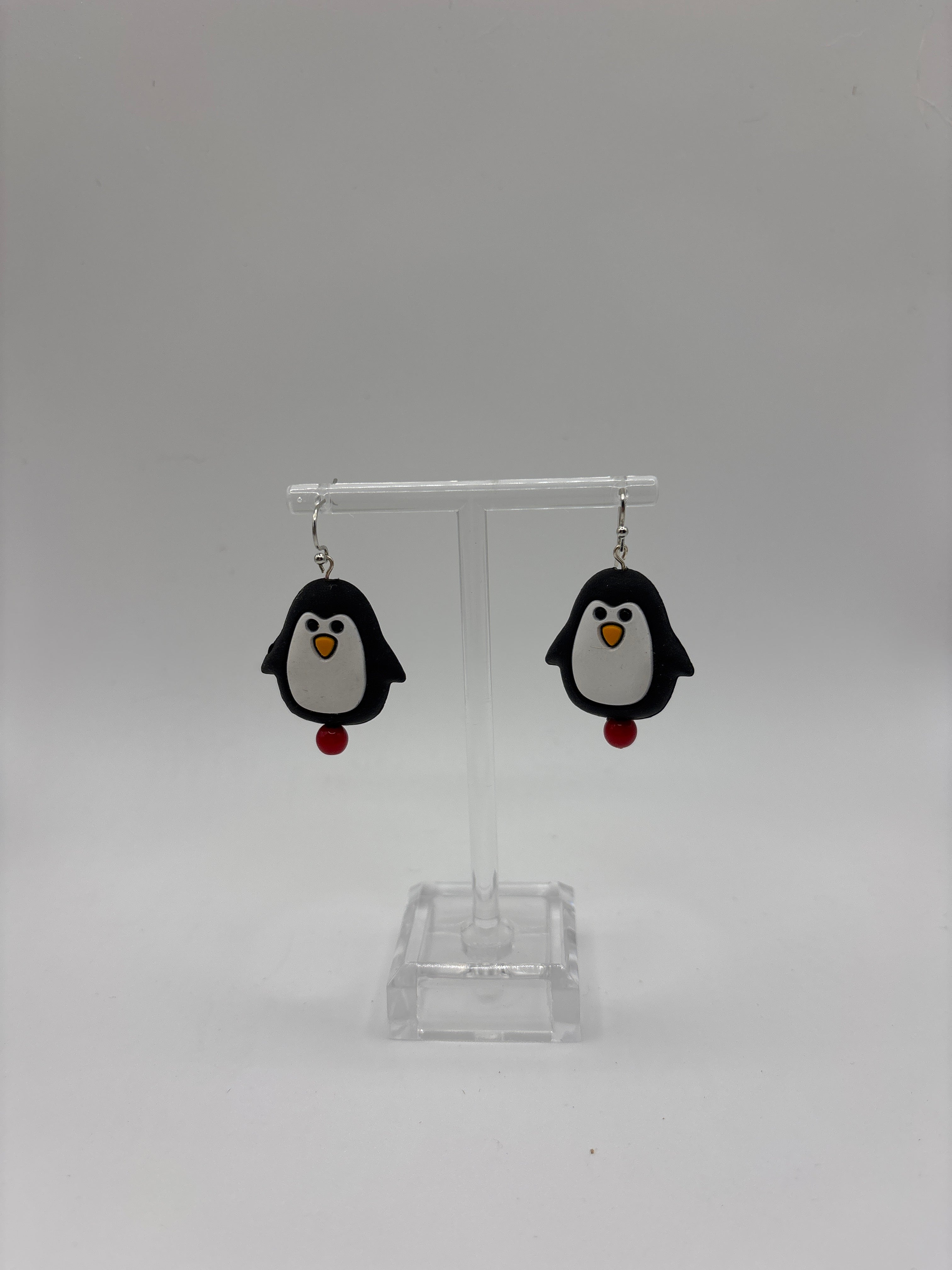 Dancing Puffy penguin, red bead