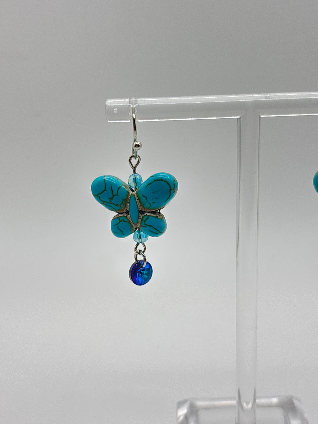 Blue butterfly with blue crystal