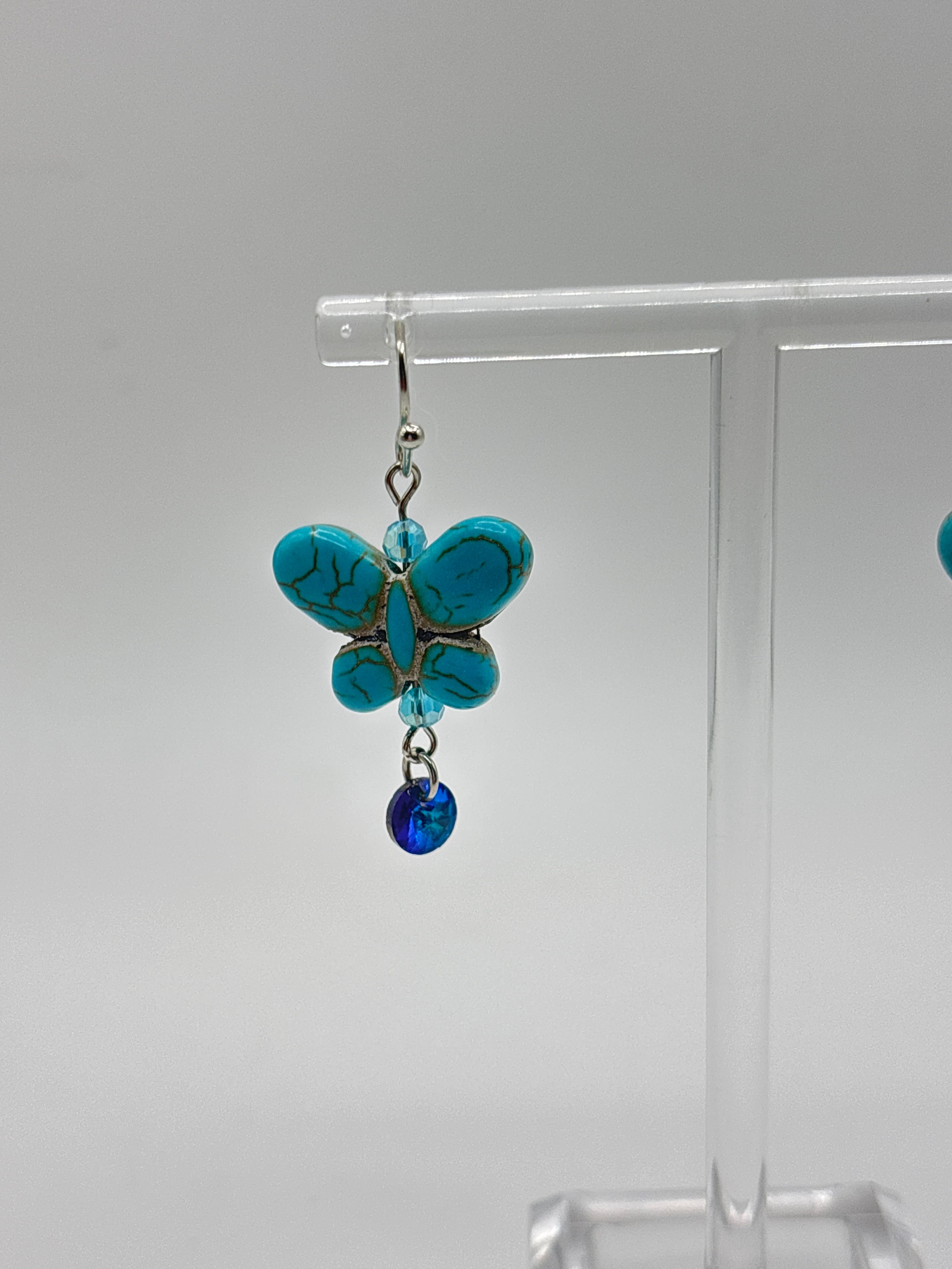 Blue butterfly with blue crystal