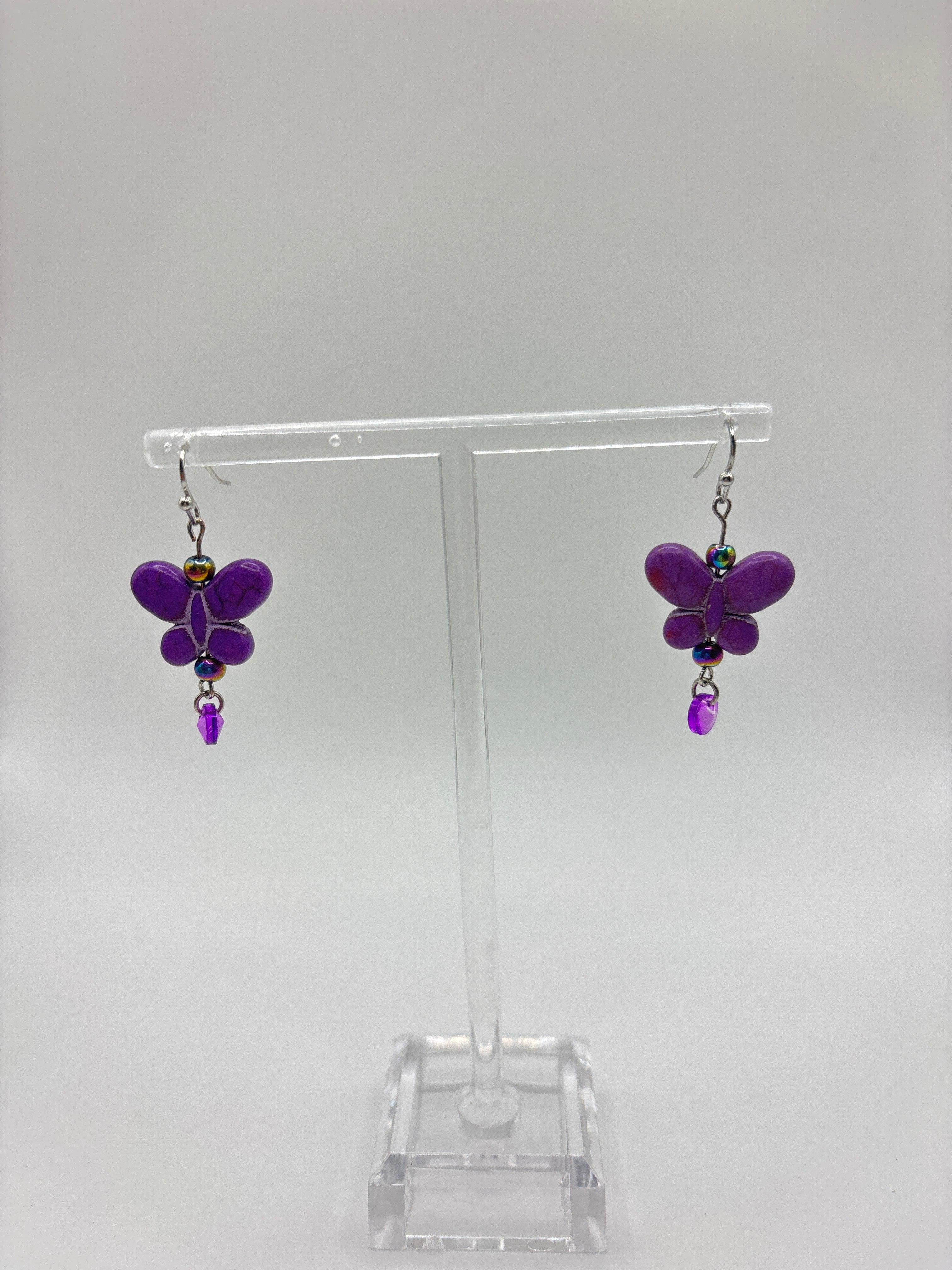 Purple butterfly with purple dangle