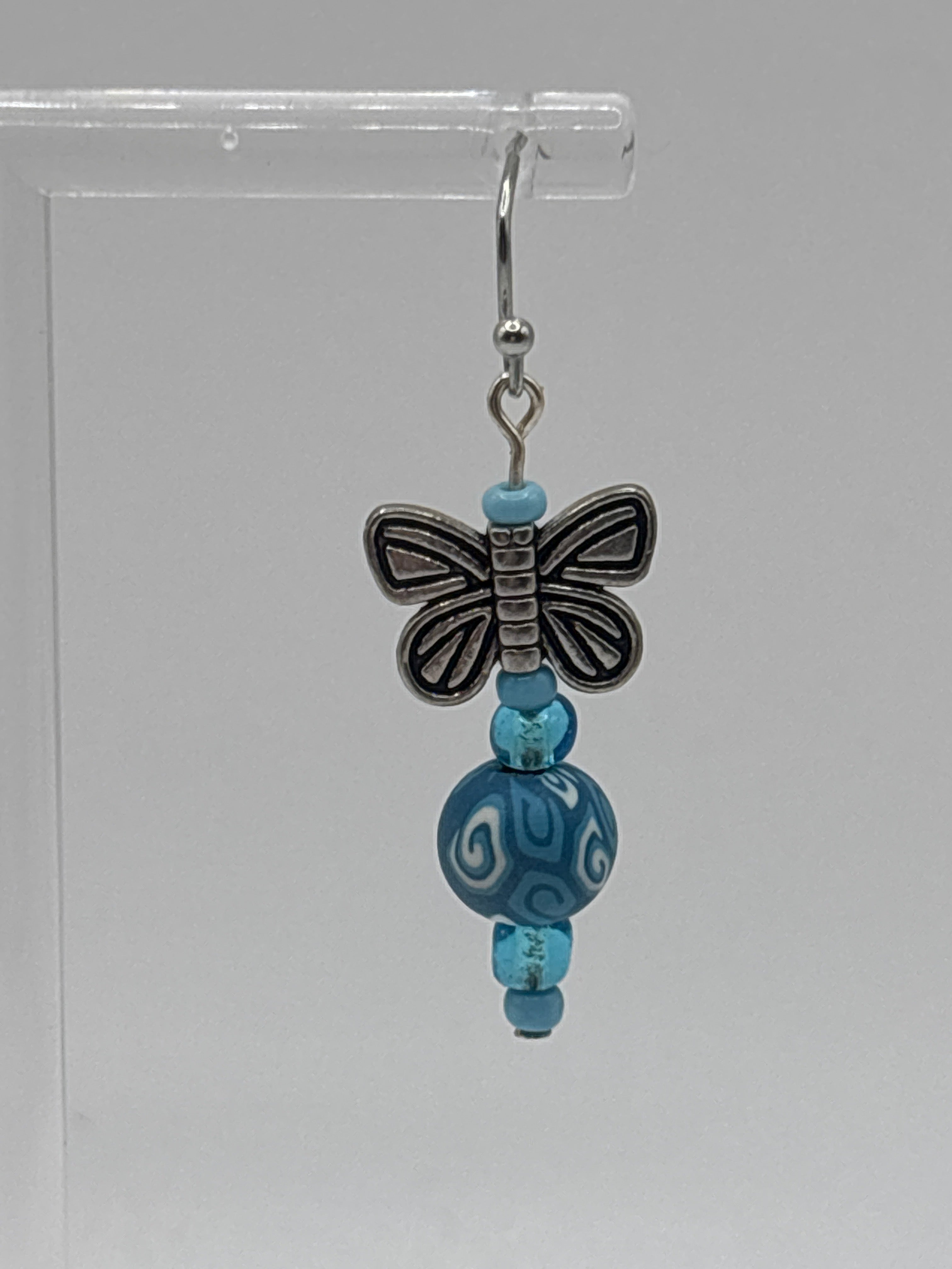 Silver tone butterfly with blue beads