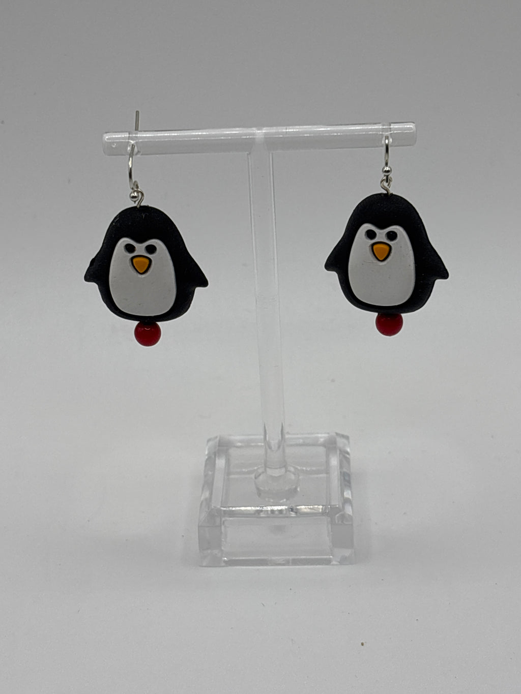 Dancing Puffy penguin, red bead