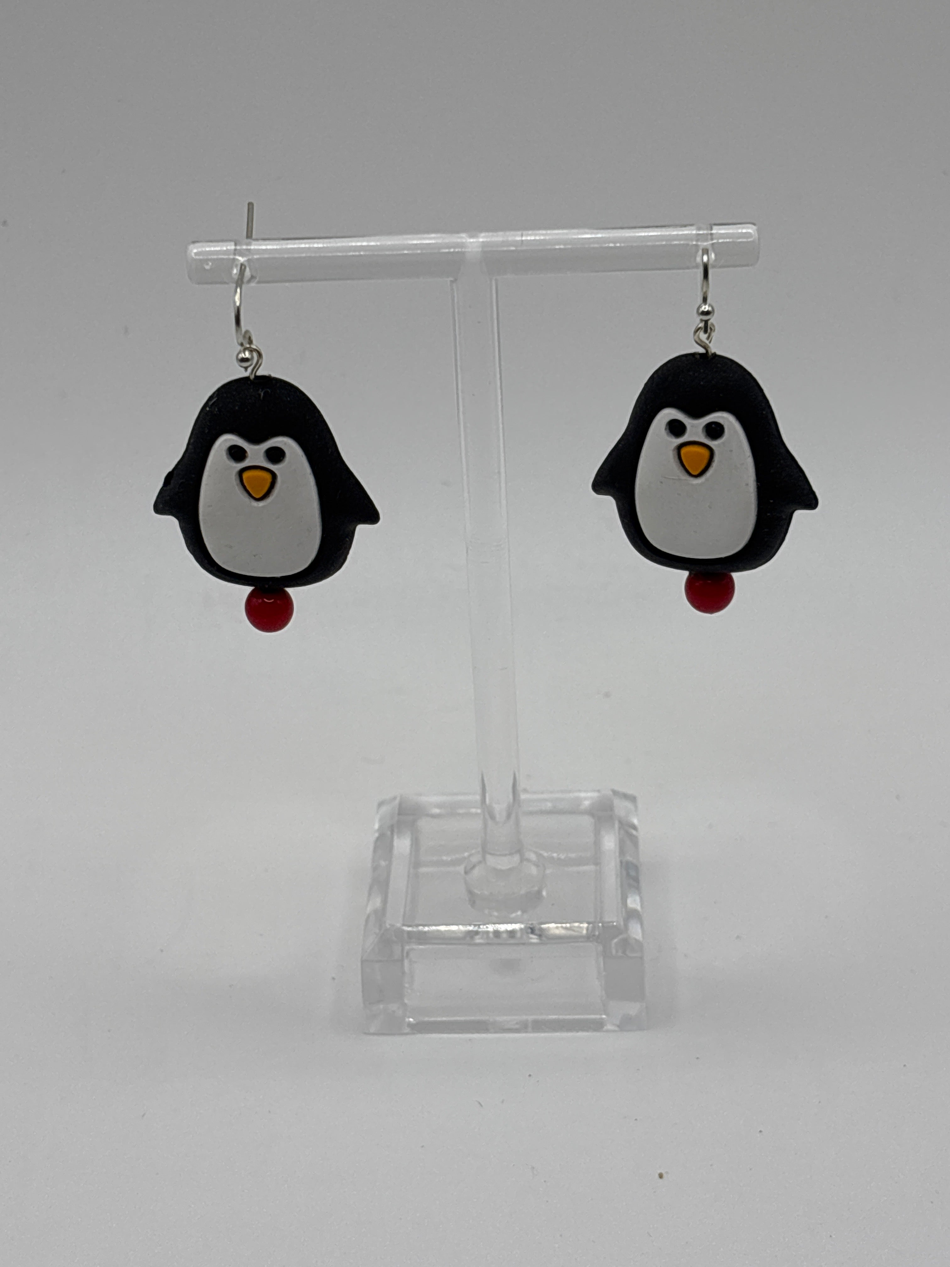Dancing Puffy penguin, red bead