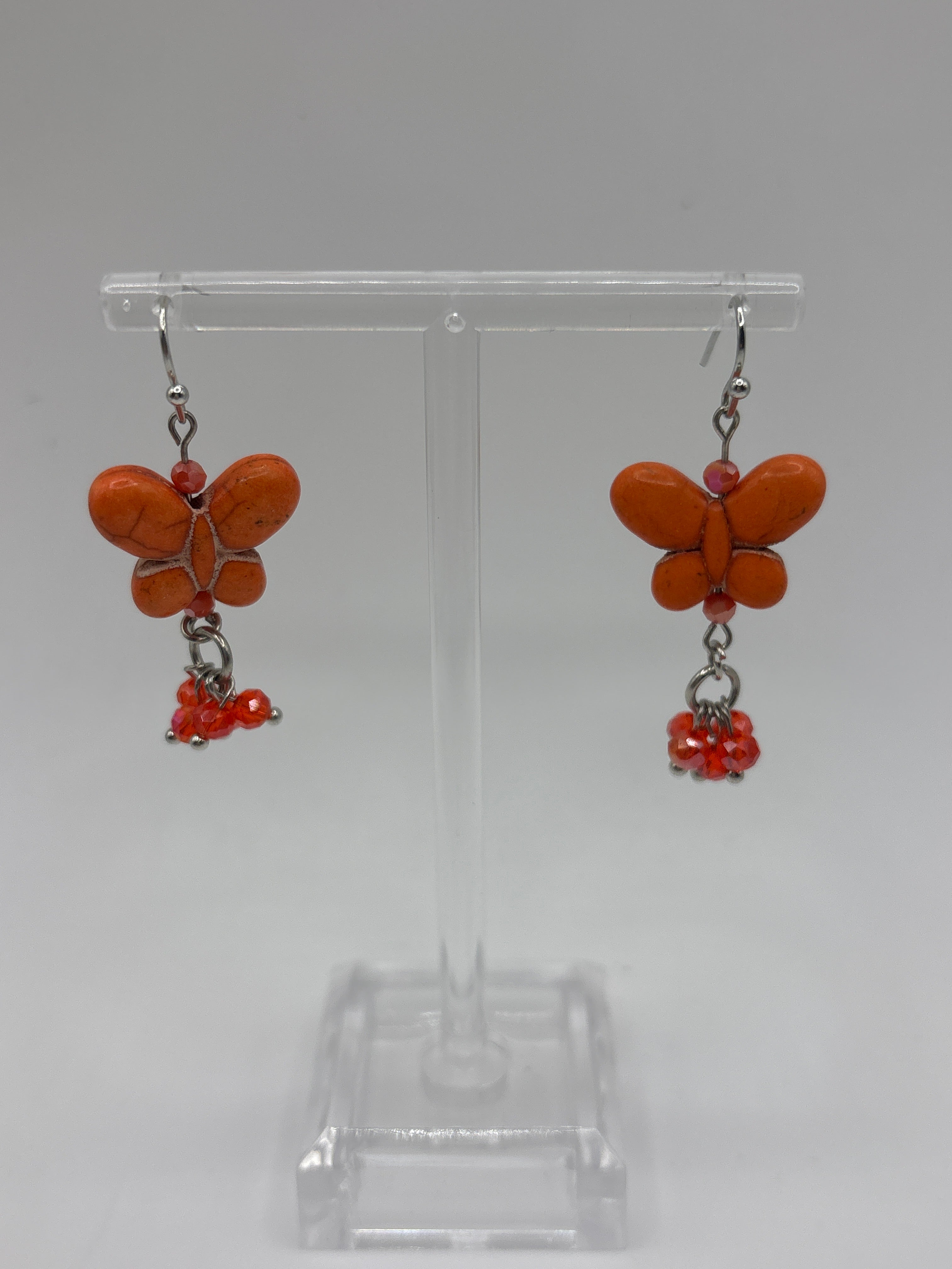 Orange butterfly with orange dangle beads