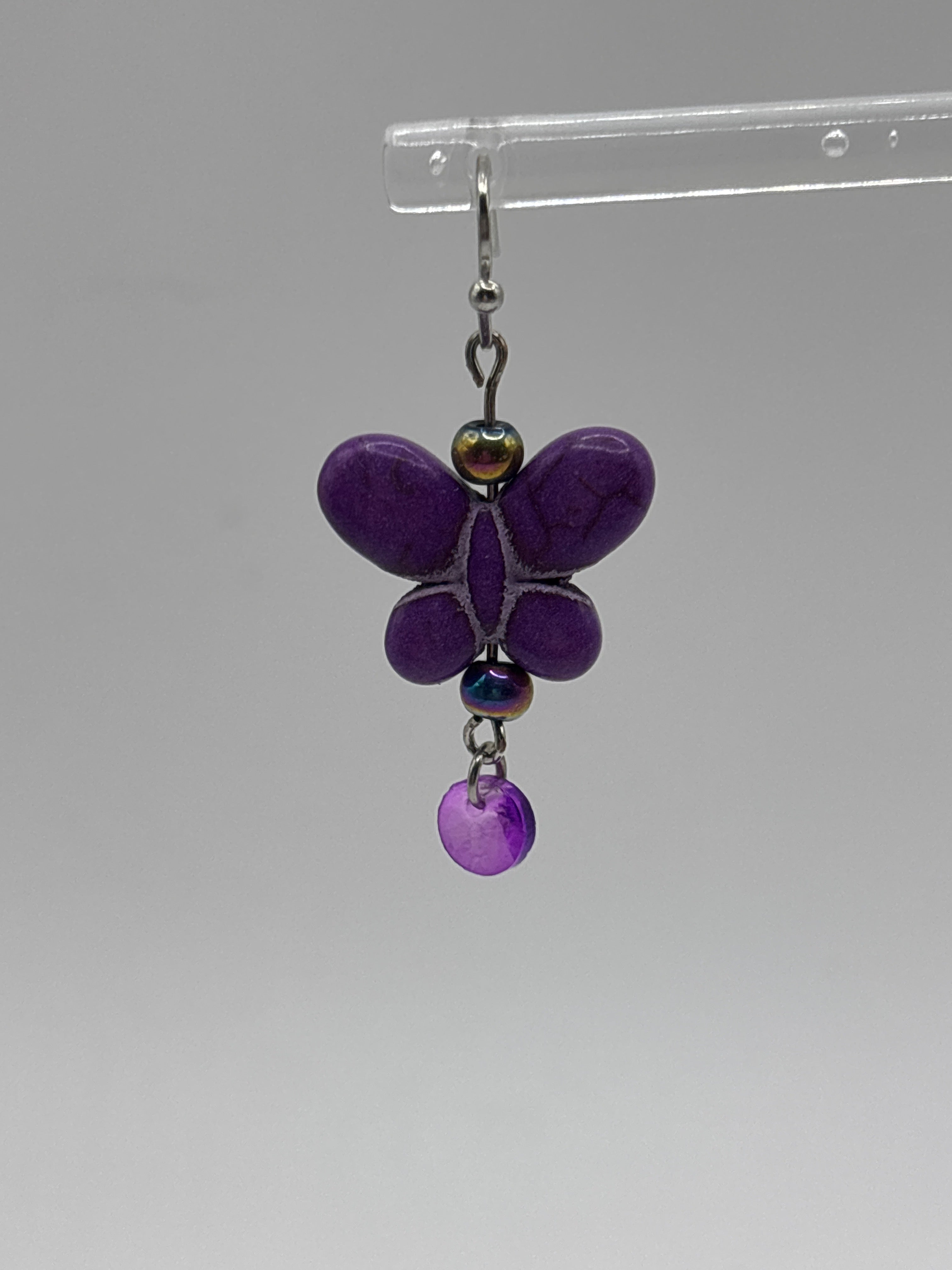 Purple butterfly with purple dangle