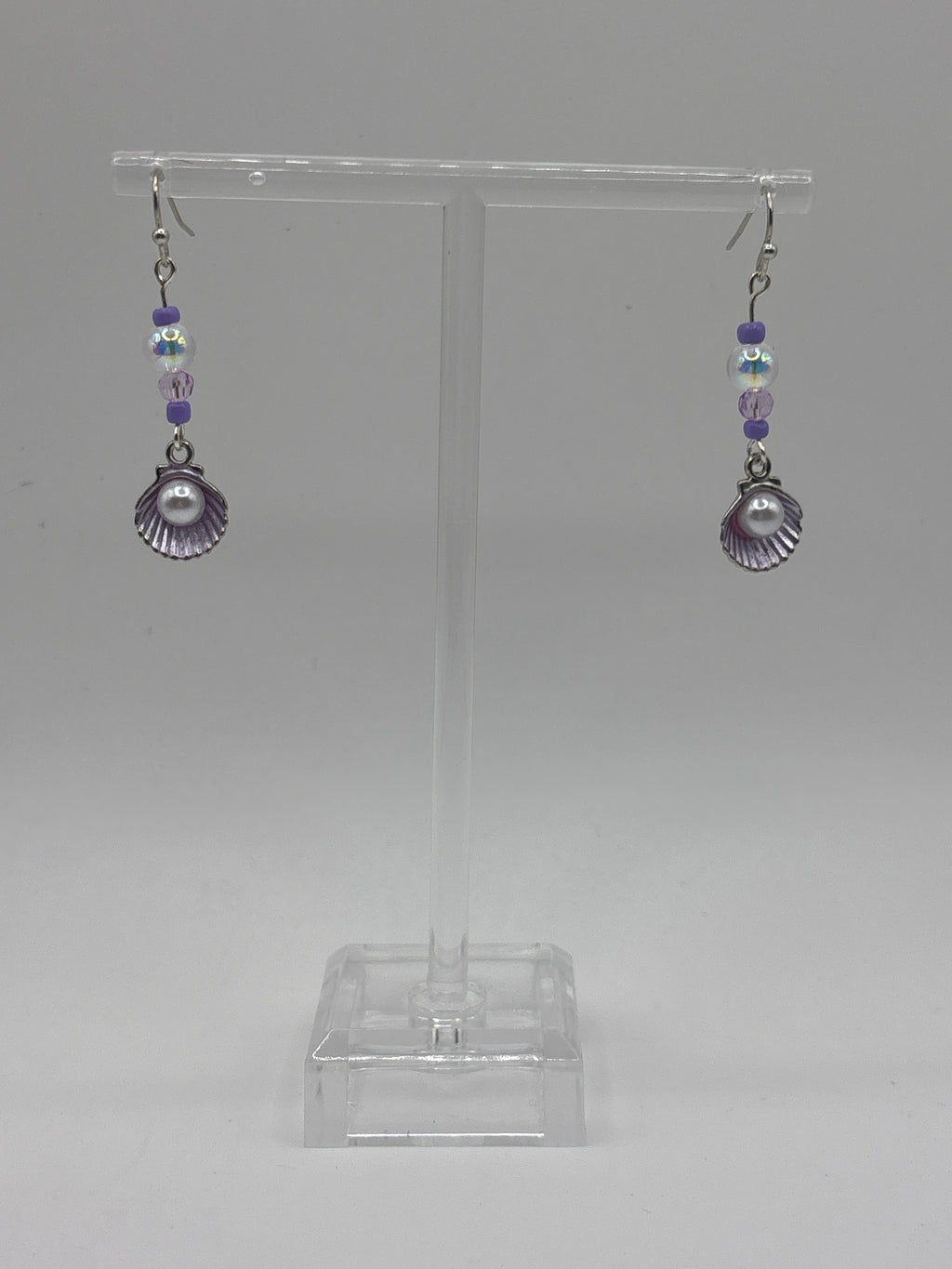Silver tone shell with pearl, single bubble and purple accents