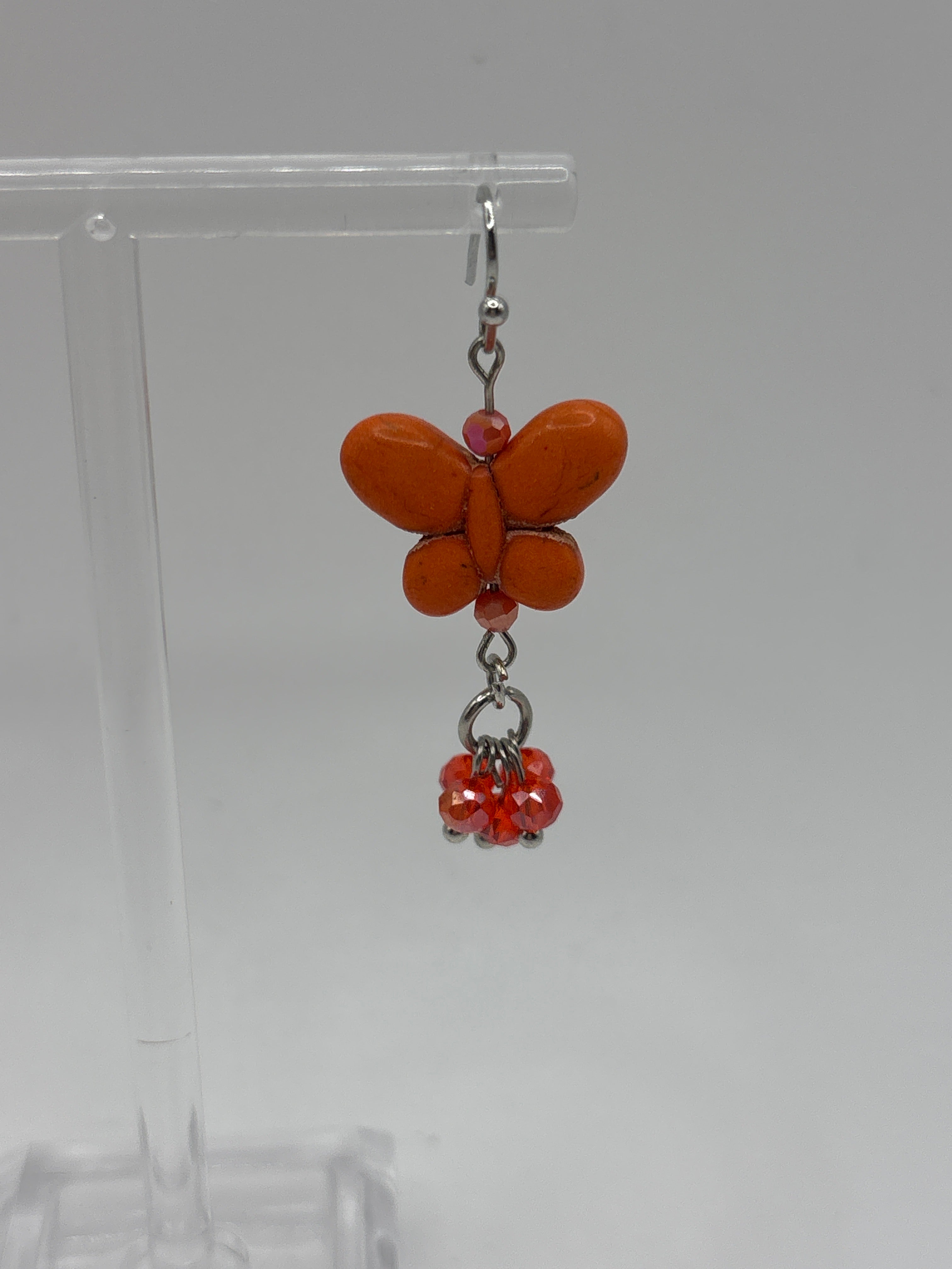 Orange butterfly with orange dangle beads