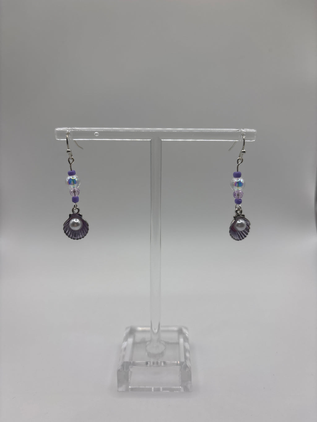 Silver tone shell with pearl, single bubble and purple accents