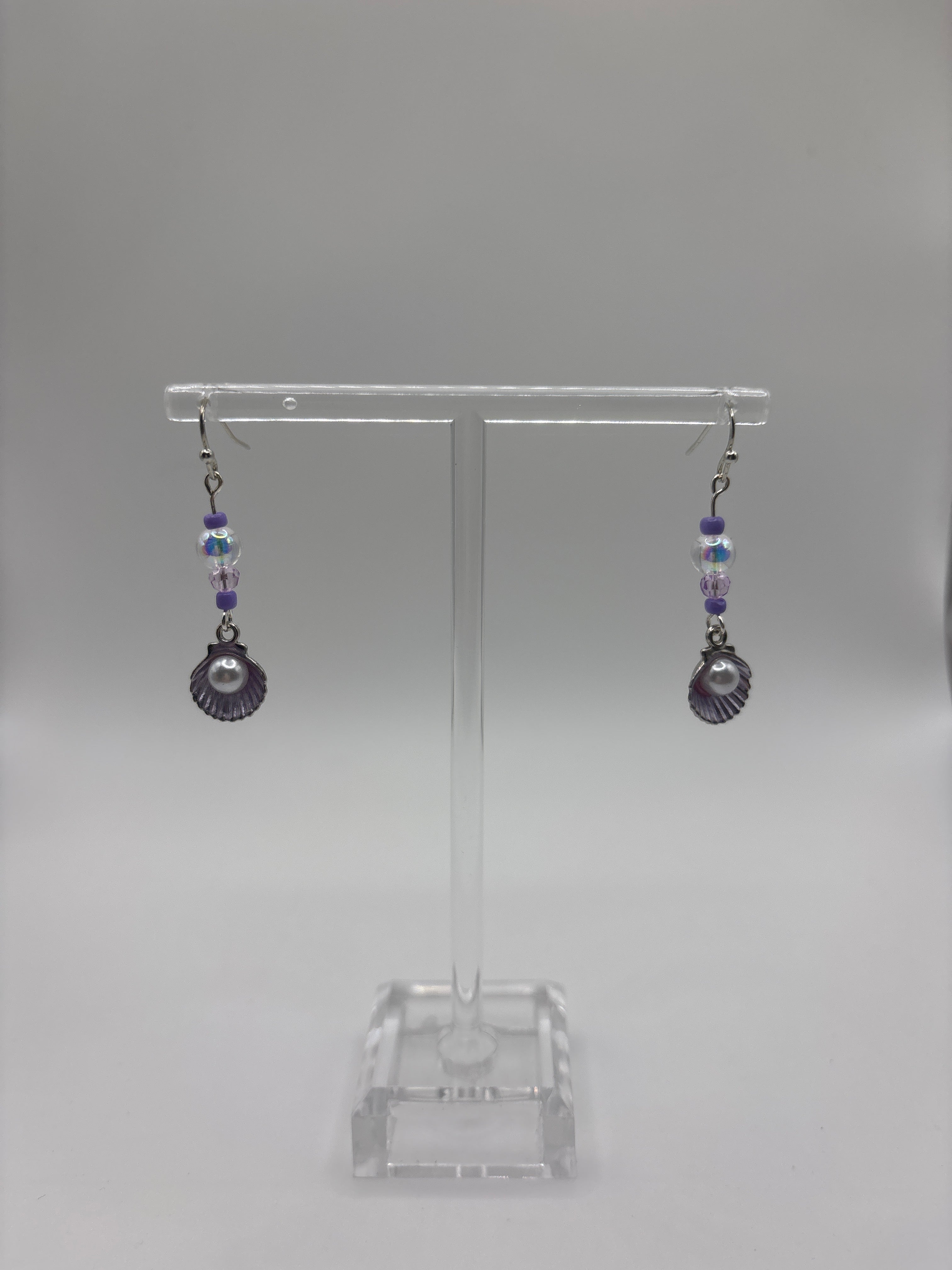 Silver tone shell with pearl, single bubble and purple accents