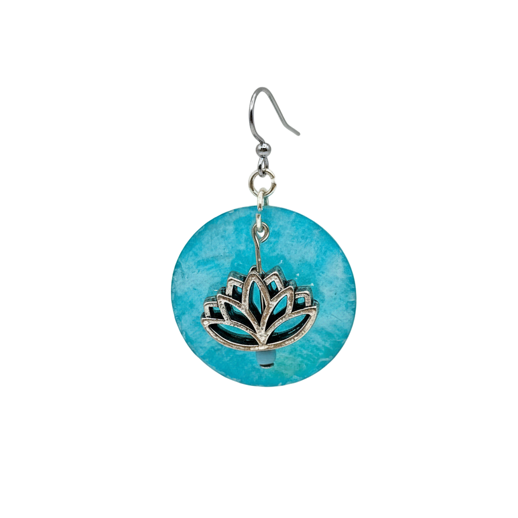 Turquoise earring with silver lotus flower design on a white background
