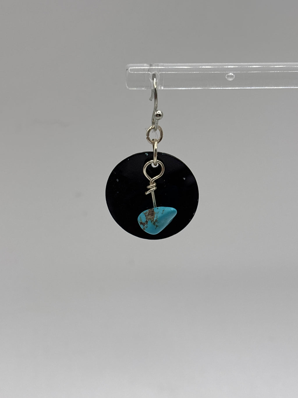Black shell with turquoise beads