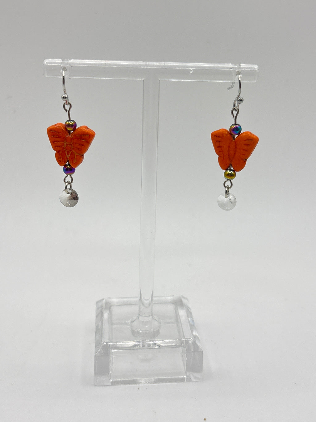 Orange butterfly with white crystal