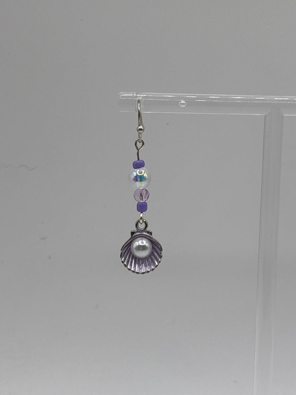 Silver tone shell with pearl, single bubble and purple accents