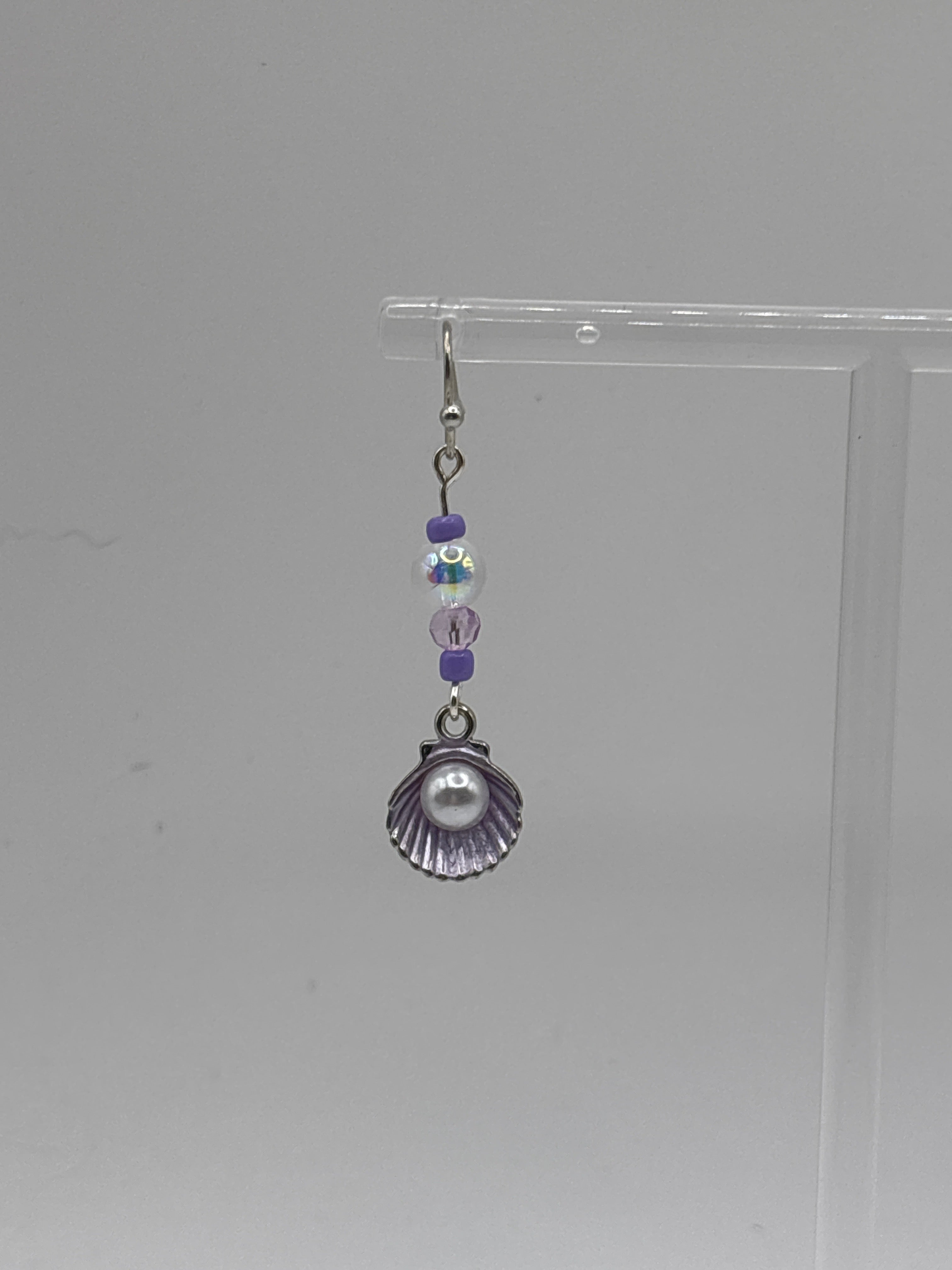 Silver tone shell with pearl, single bubble and purple accents