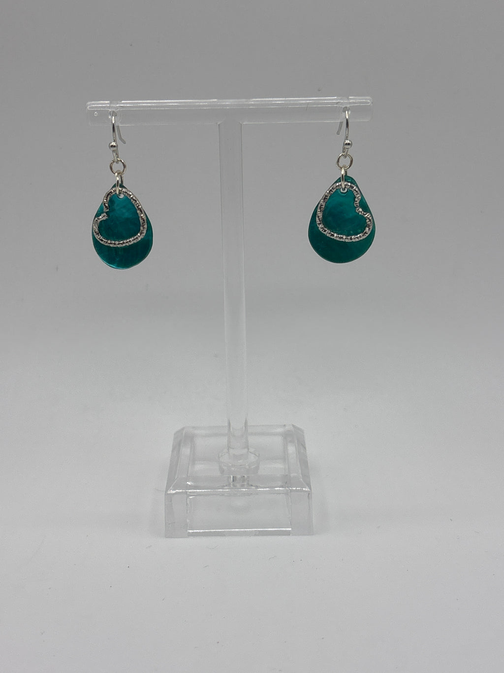 Ocean blue shell teardrop with silver tone braided heart