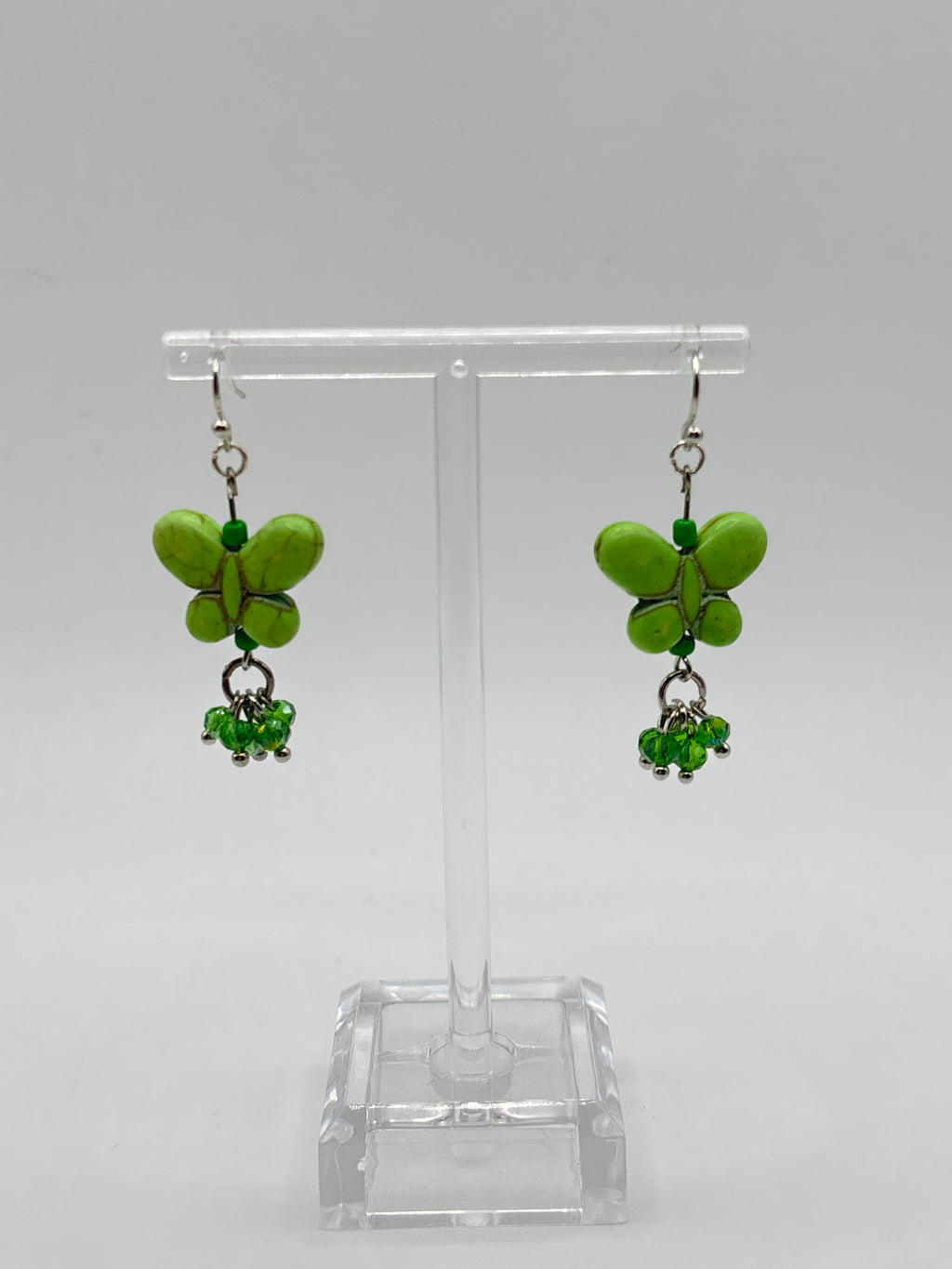 Green butterfly with green dangle crystals