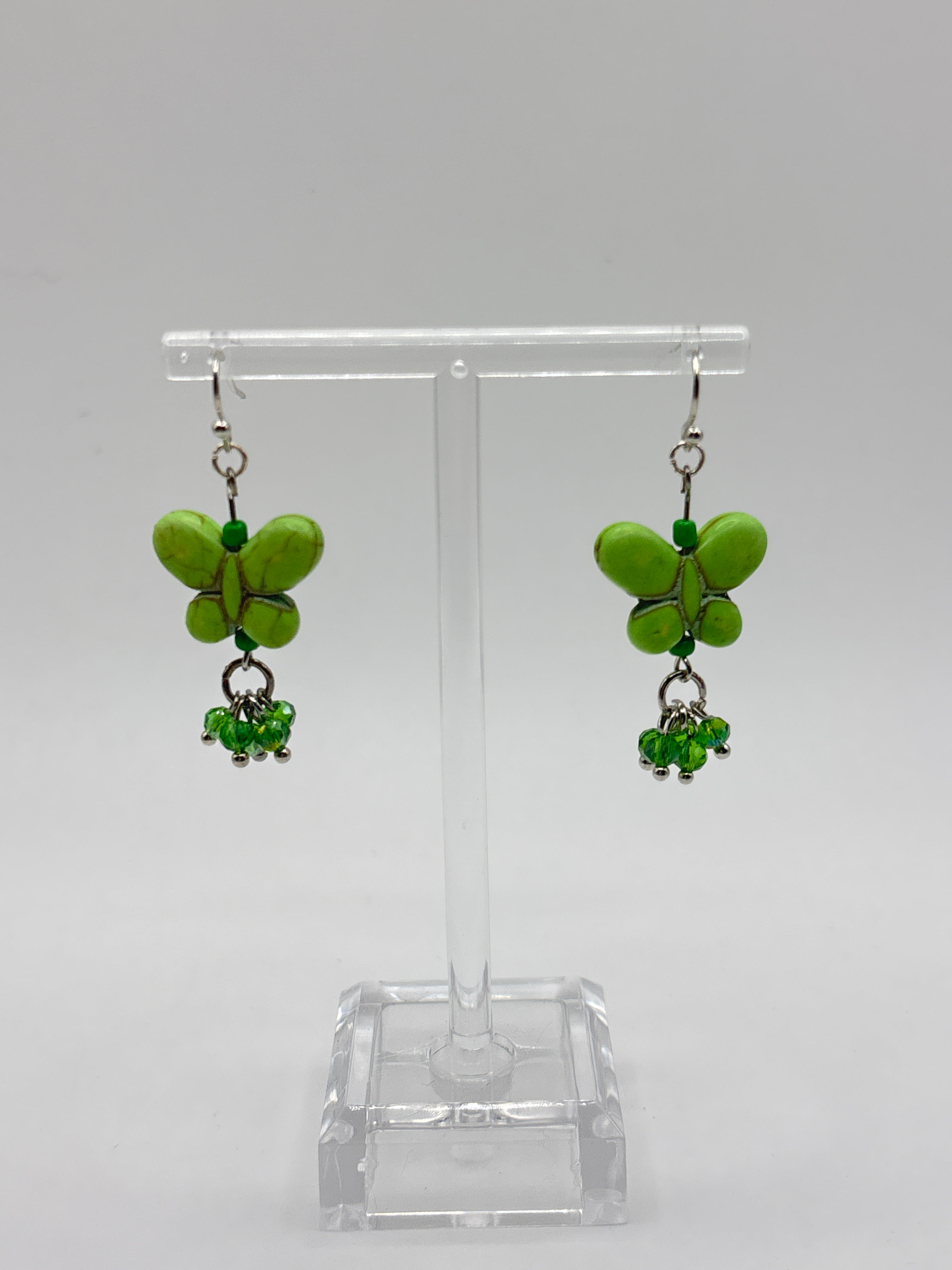 Green butterfly with green dangle crystals