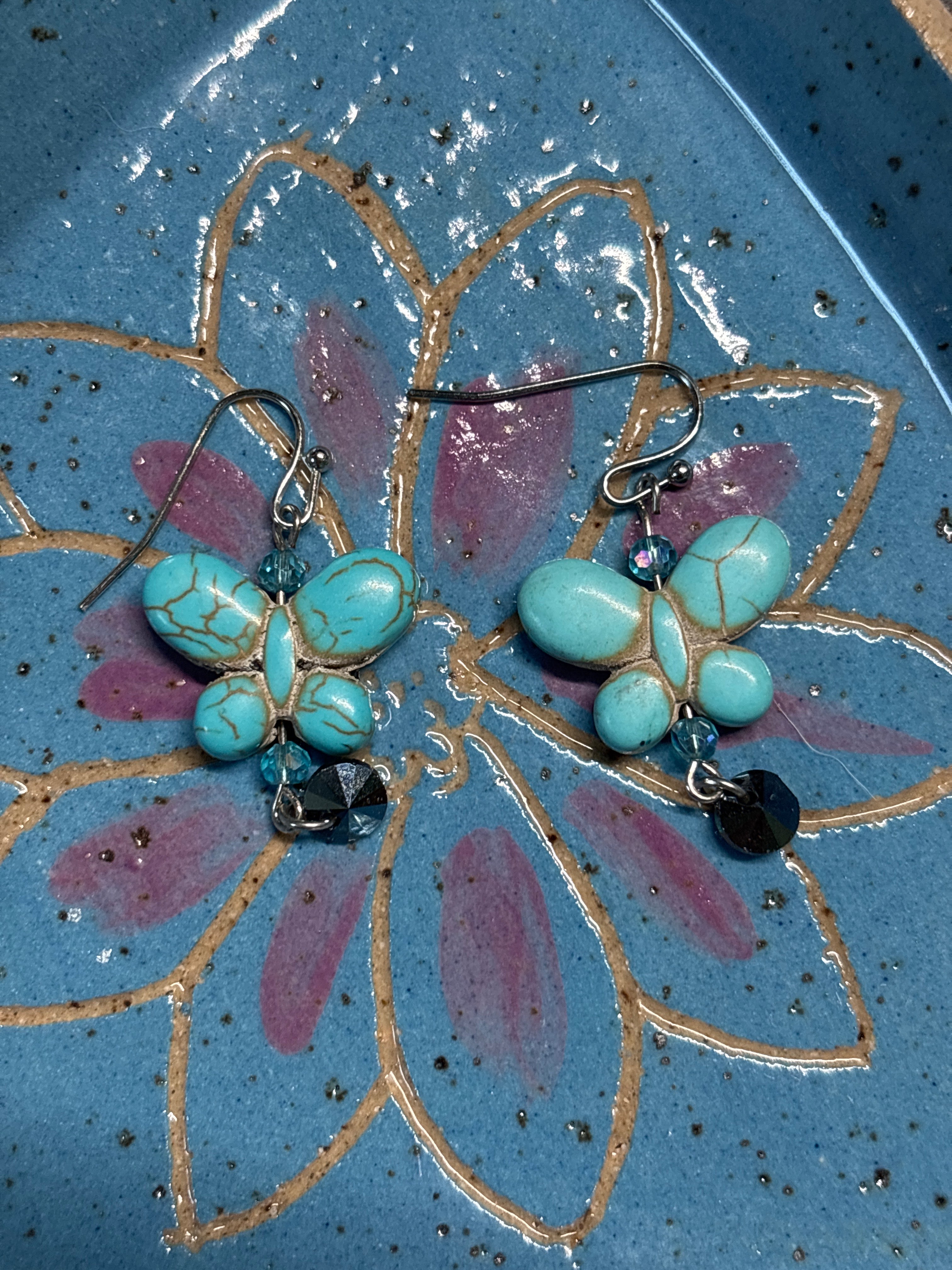 Blue butterfly with blue crystal