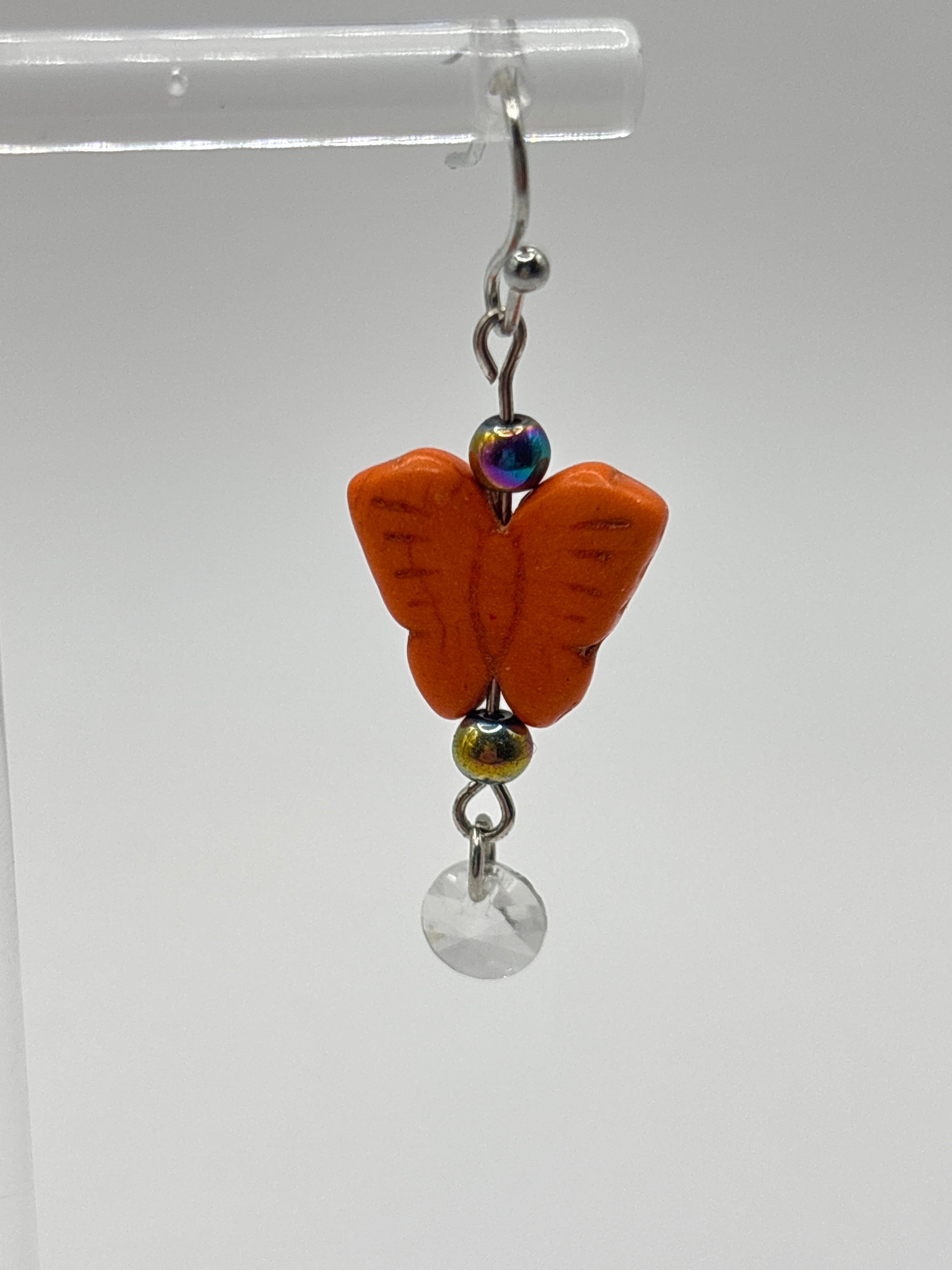Orange butterfly with white crystal