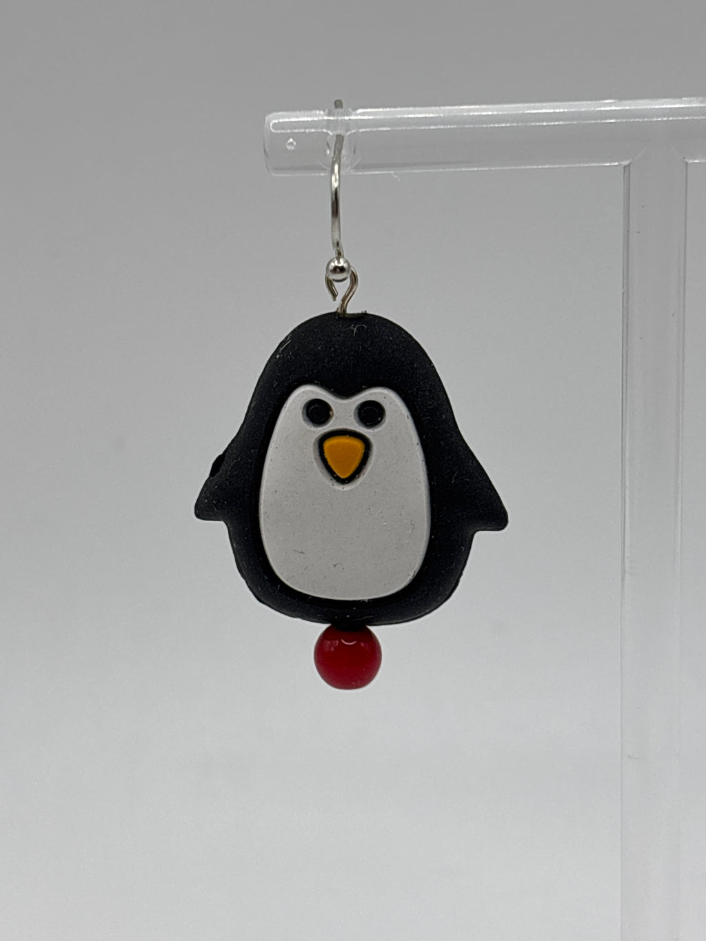 Dancing Puffy penguin, red bead