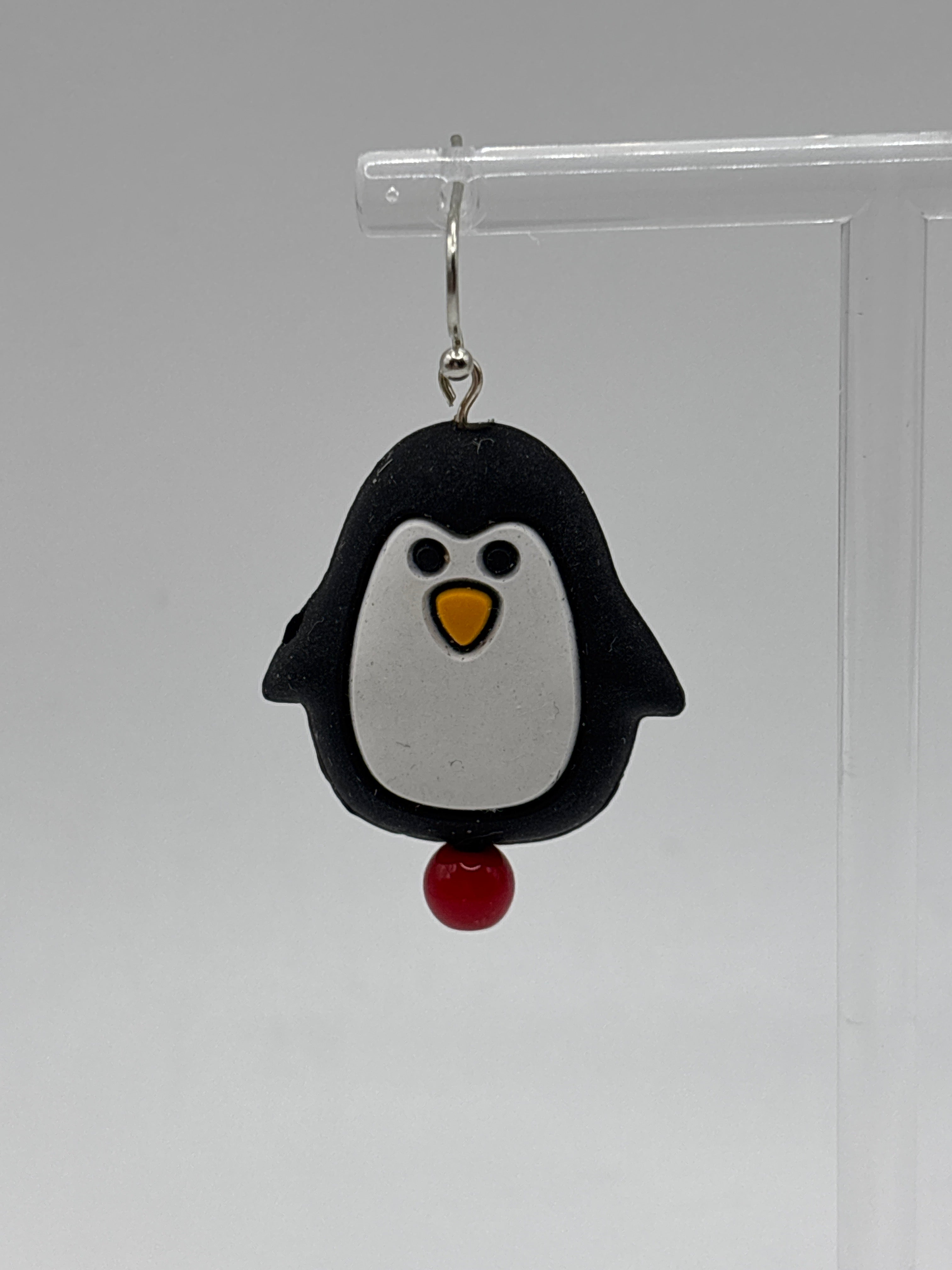 Dancing Puffy penguin, red bead