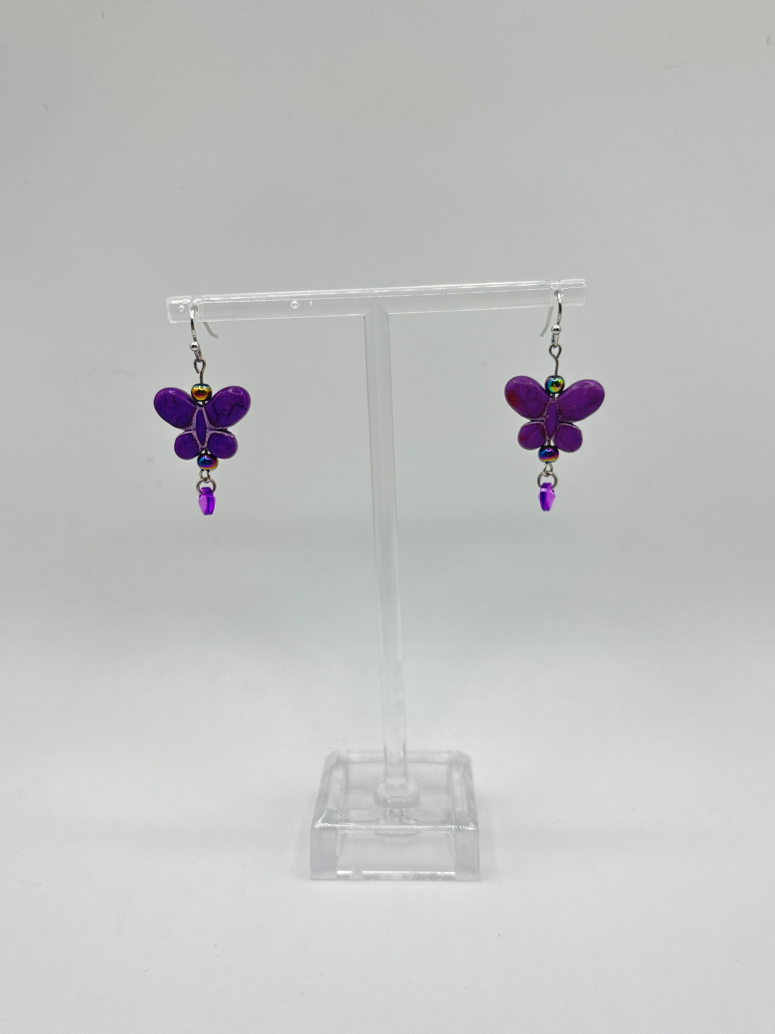 Purple butterfly with purple dangle