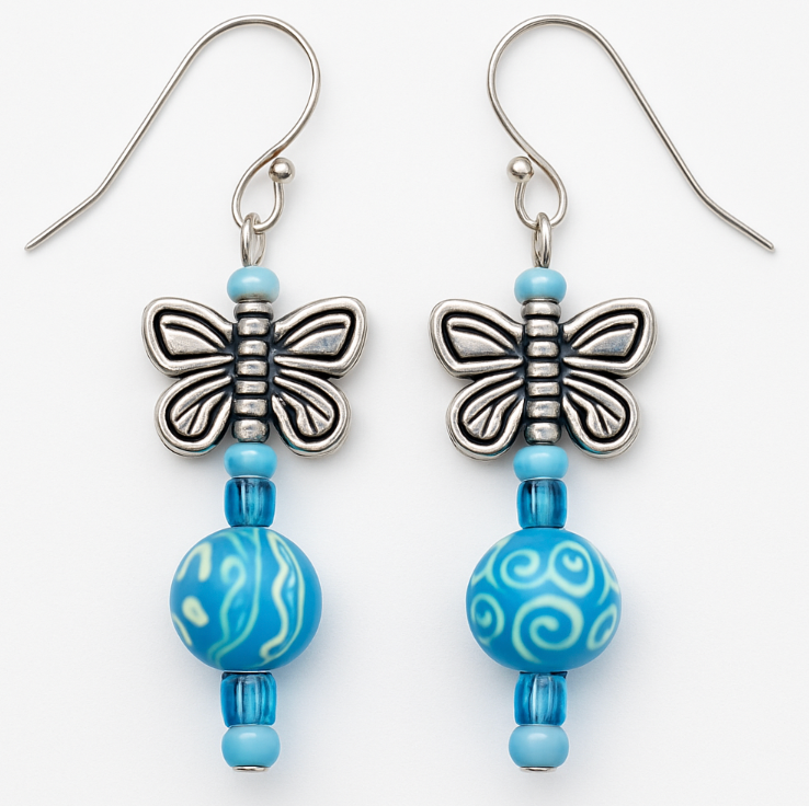 Silver tone butterfly with blue beads